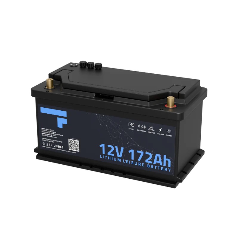 A black Fogstar Drift 172Ah DIN Fit 12V lithium leisure battery with labelled terminals and a blue label on the front.