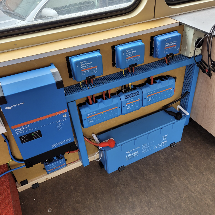 Huey's electrical Victron set up in his van below the windows