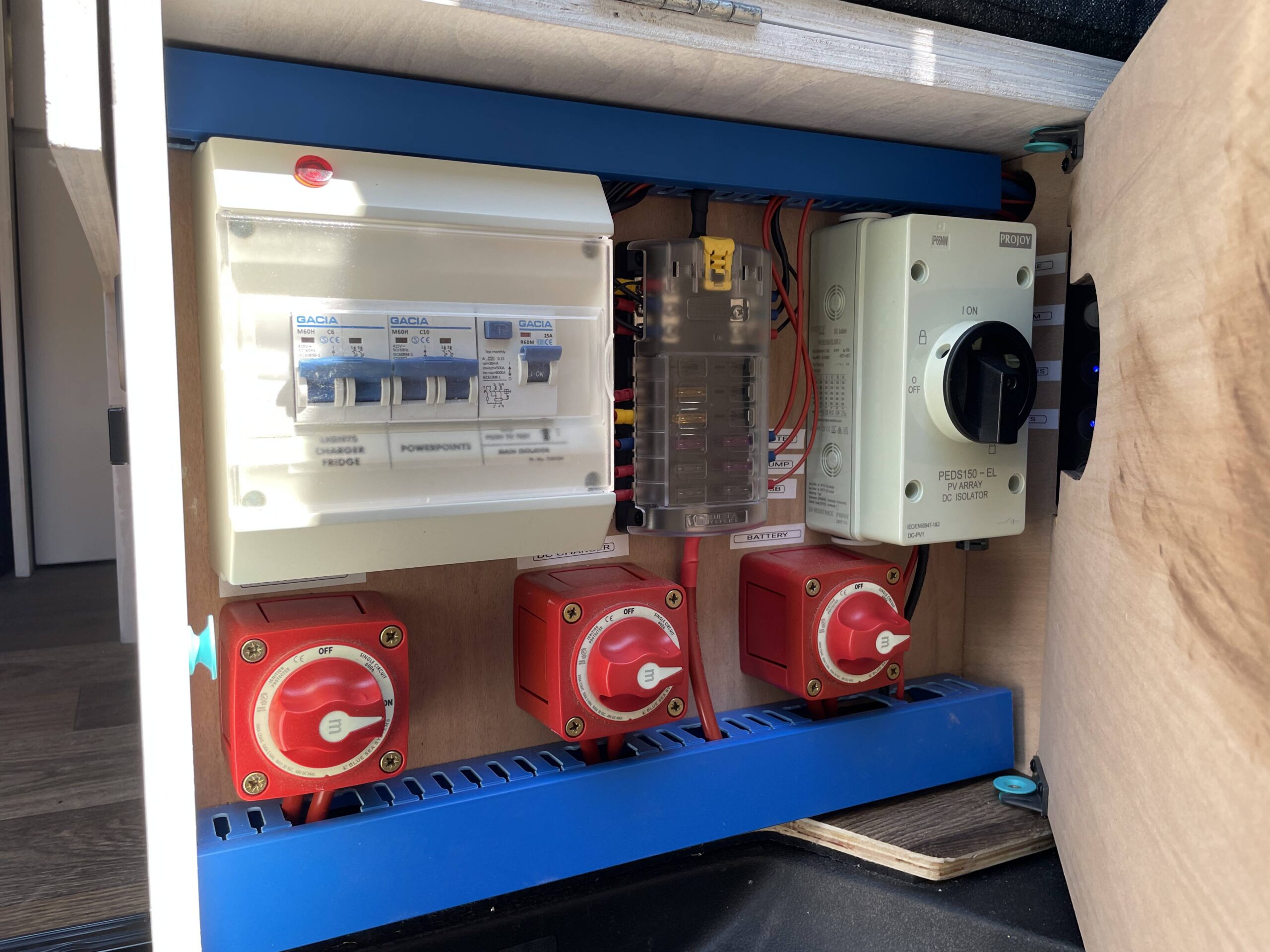 switches on the electric board of Sean Wilson's Vauxhall Vivaro
