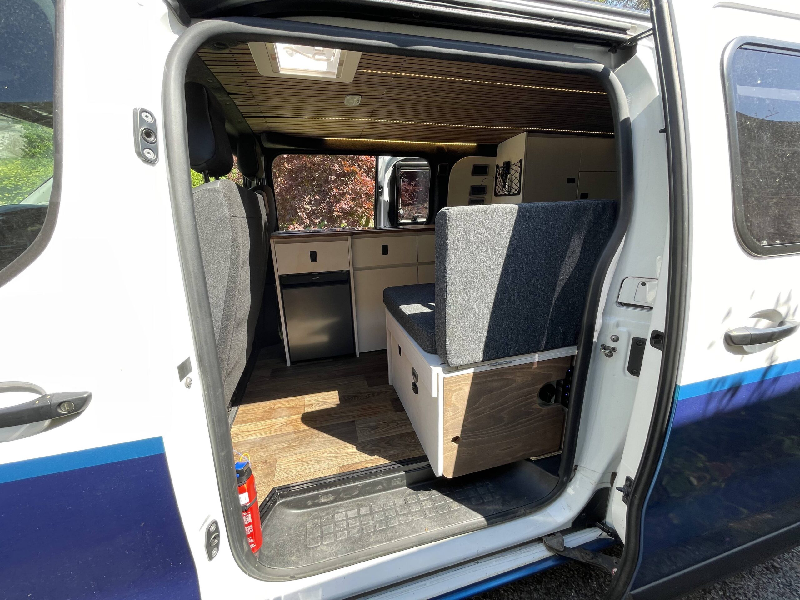 looking into Sean Wilson's Vauxhall Vivaro through the sliding door